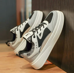 Chaussure streetwear gris foncé et noir pour femme ou homme, baskets montantes inspirées de l’espadrille avec détails techniques et confort amélioré

